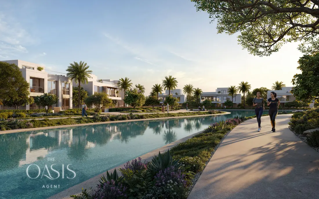 Lagoon walkway through the landscaped waterway at The Oasis by Emaar